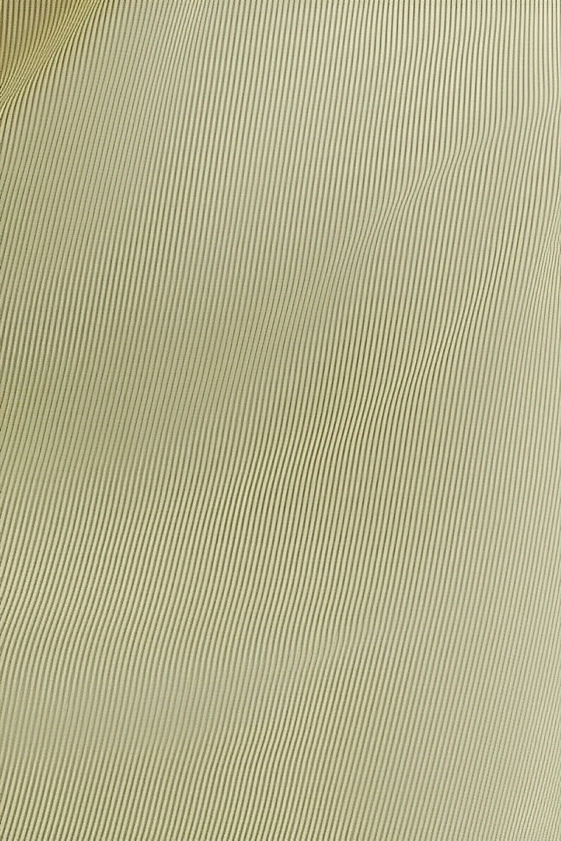 Close-up fabric texture of private label silk pajamas with lace showing smooth ribbed silk material