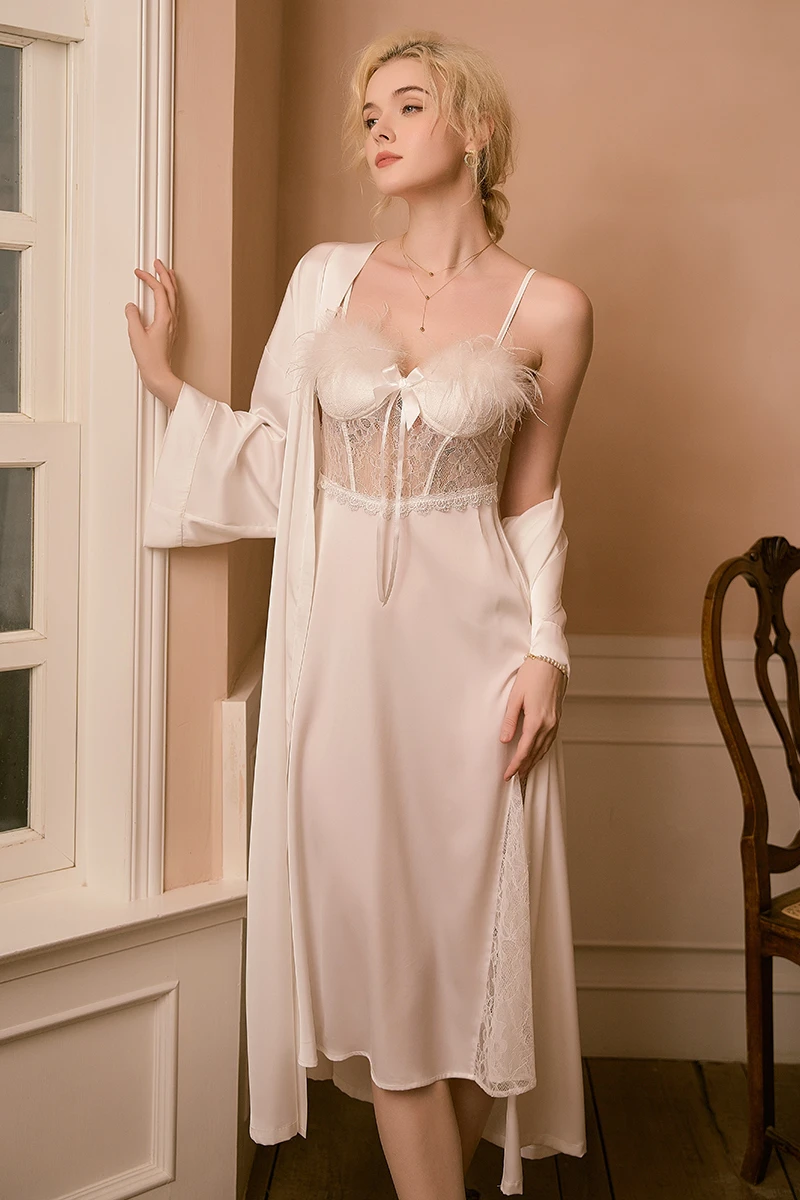 Model wearing white private label women sexy nightgowns featuring sheer lace panels, feather-trimmed bust, long skirt length, and coordinated outer robe.