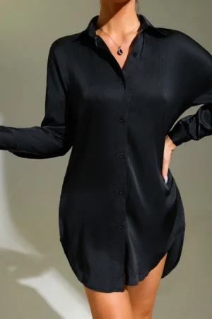 Black sexy cotton nightgown with long sleeves and button front, showcasing a minimalist and sensual sleepwear look