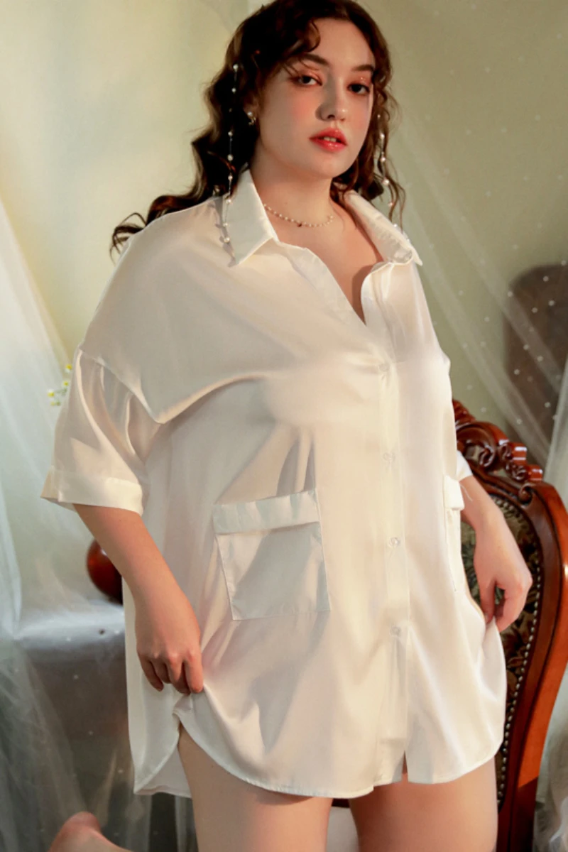 Model wearing a white sheer sleep shirt style sexy nightgowns for women with loose fit and soft lightweight fabric