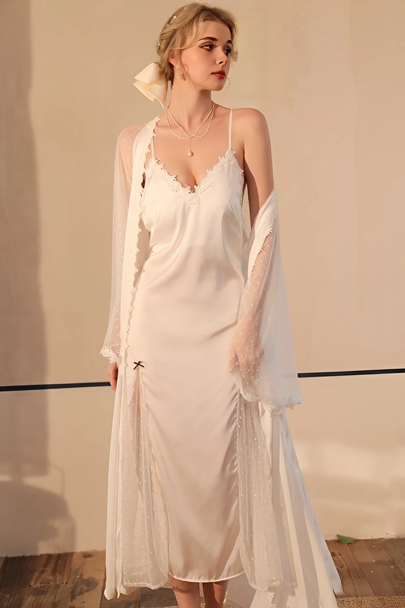 Model wearing a white sexy silk nightgown with lace neckline, silk slip dress, and sheer long sleeve robe