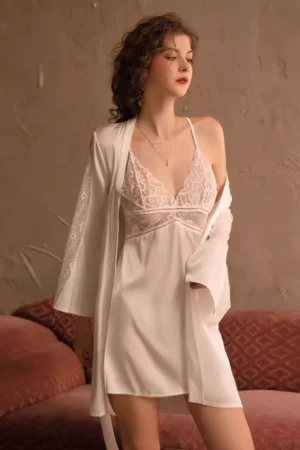 Model wearing a white lace nightgown with matching robe, designed for b2b lace sexy nightgowns collections