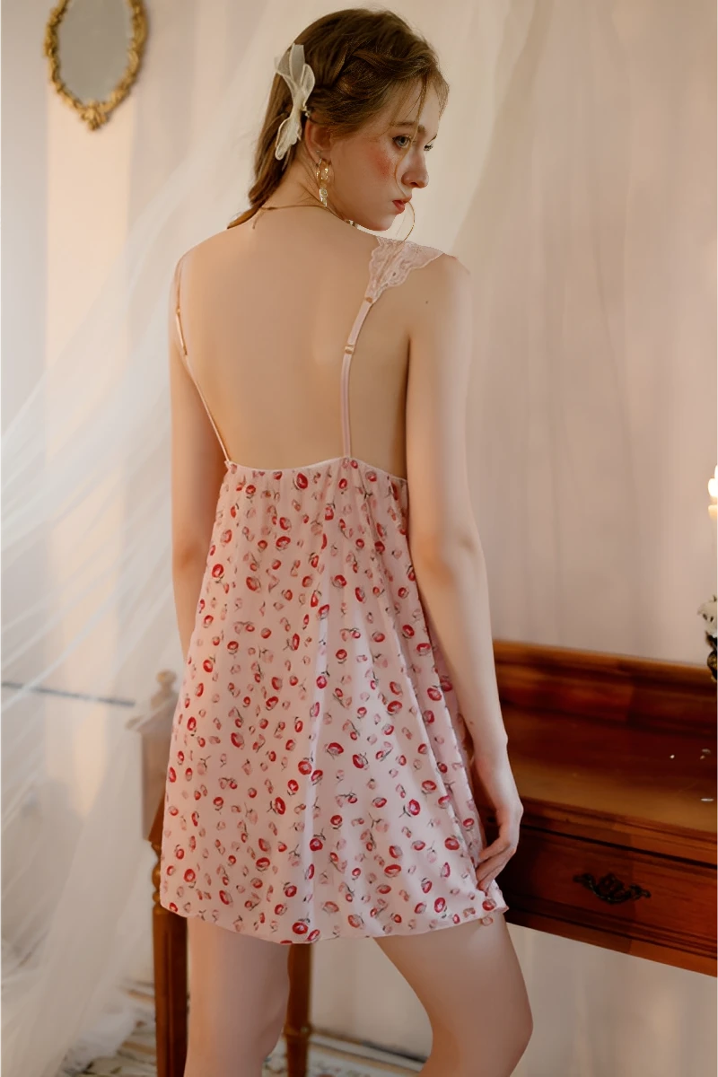 Back view of a wholesale lace silk pajama set showing adjustable shoulder straps and soft draped silk fabric