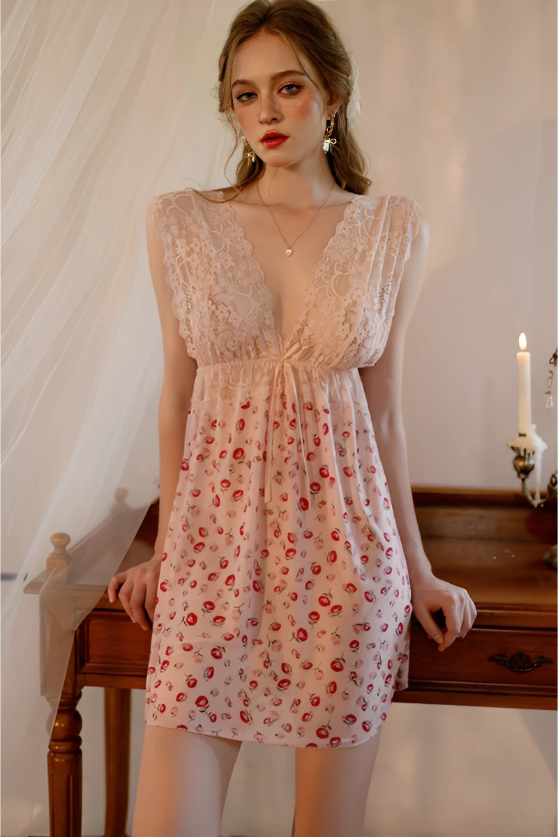 Model wearing a wholesale lace silk pajama set featuring a deep V-neck lace bodice and soft floral printed silk fabric