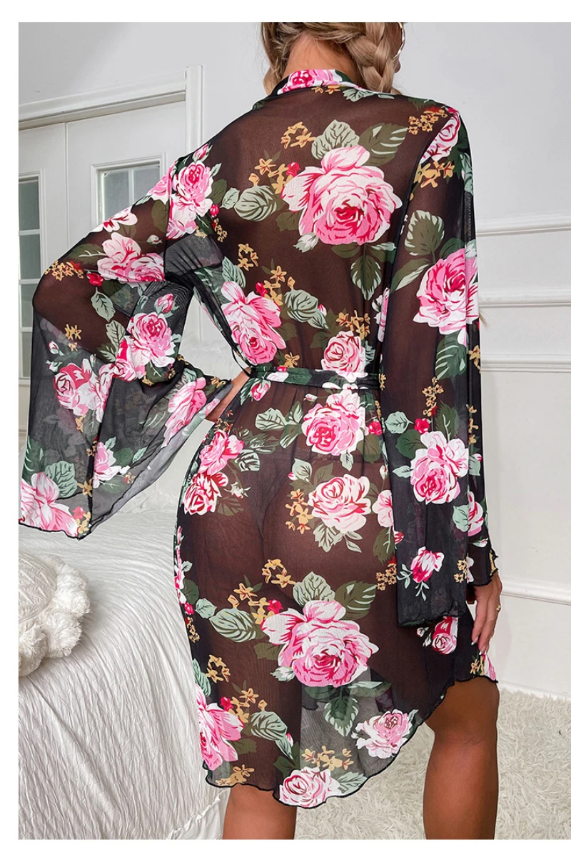 Back view of a wholesale sexy black nightgown with transparent floral mesh fabric, relaxed fit, and lightweight drape suitable for lingerie wholesale buyers.