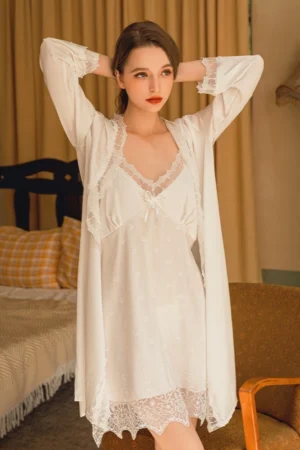White long lace nightgown with sheer long sleeves and V-neck design, suitable for wholesale sexy long nightgowns supply.