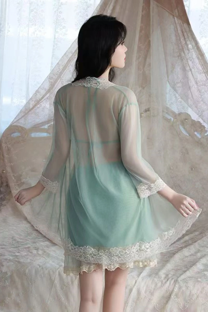 Back view of a wholesale sexy silk nightgown showing sheer fabric, lace hem, and lightweight drape designed for women’s nightwear.