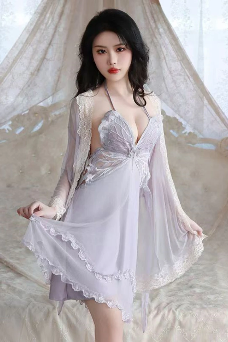 Model wearing a wholesale sexy silk nightgown in soft lavender with lace bodice and flowing silk skirt for lingerie wholesale display.