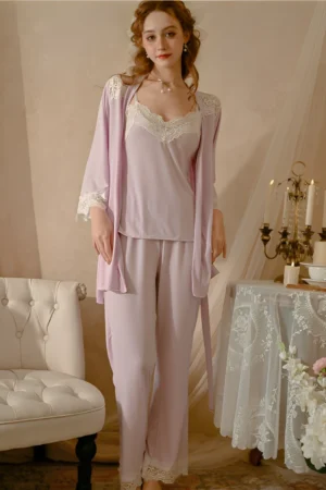 Model wearing a lavender b2b Floral Lace Sexy Nightgown with delicate floral lace trim and matching robe in an elegant indoor setting